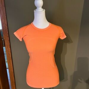 Lululemon size 4 Running T-Shirt in soft orange